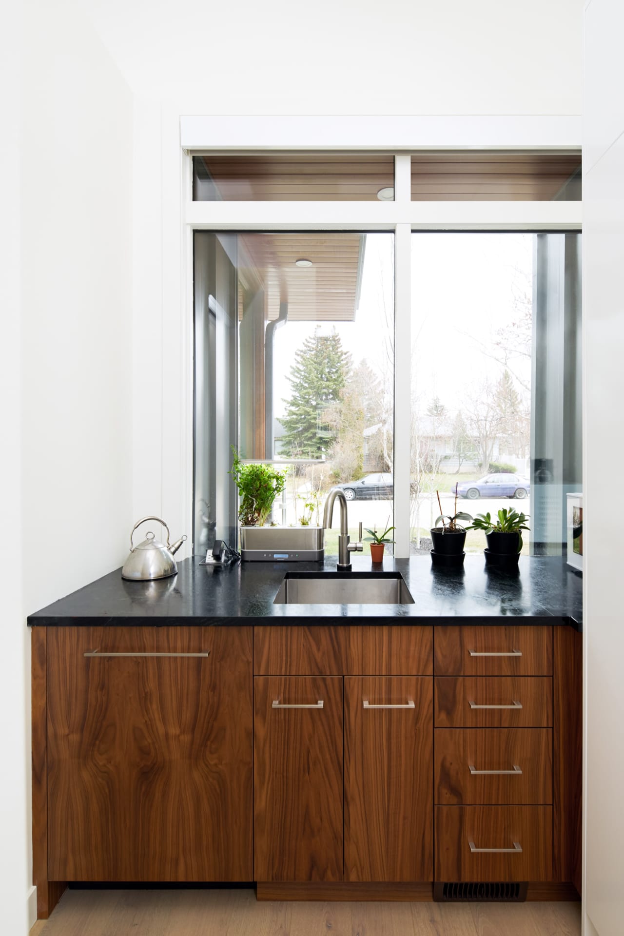 The butler's pantry with a seperate sink and dishwasher keep this kitchen organized.